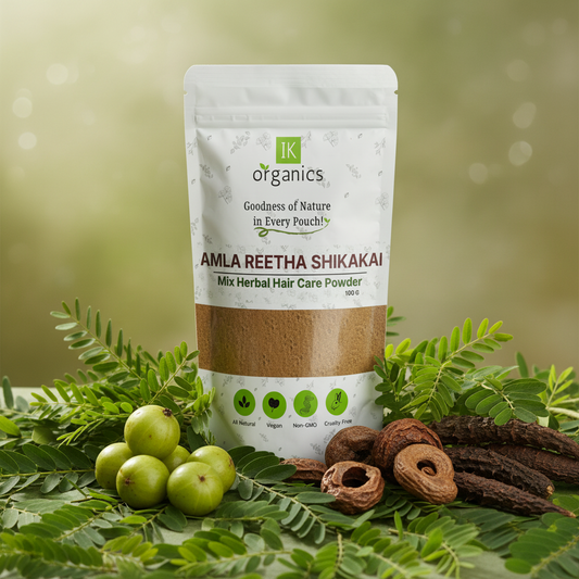 Package of IK Organics Amla Reetha Shikakai herbal hair care powder on a natural background
