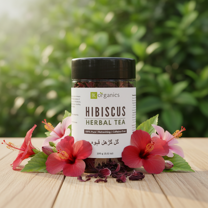Jar of hibiscus herbal tea with a black lid on a white background by IK Organics